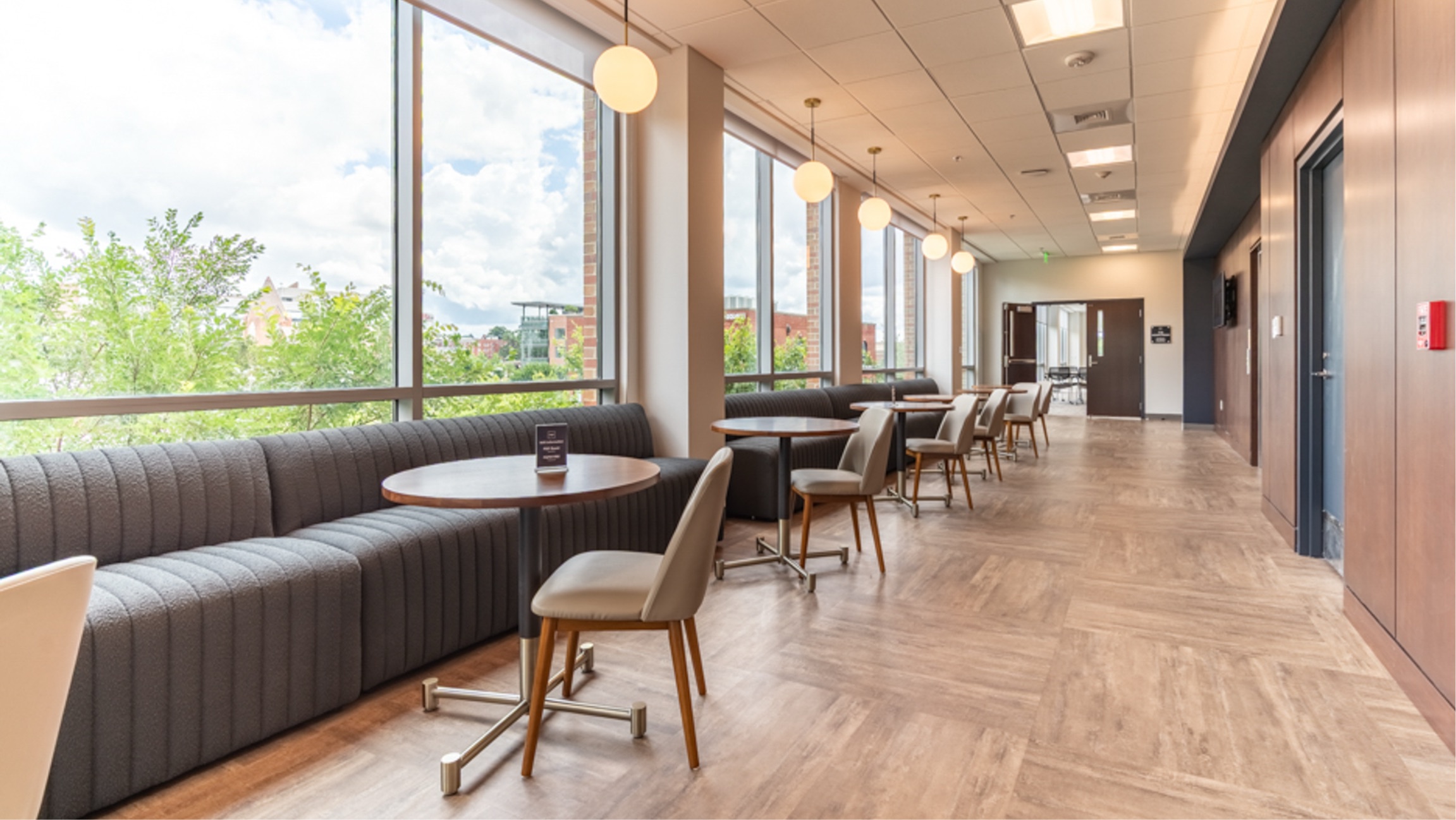 Commercial dining area with herringbone flooring