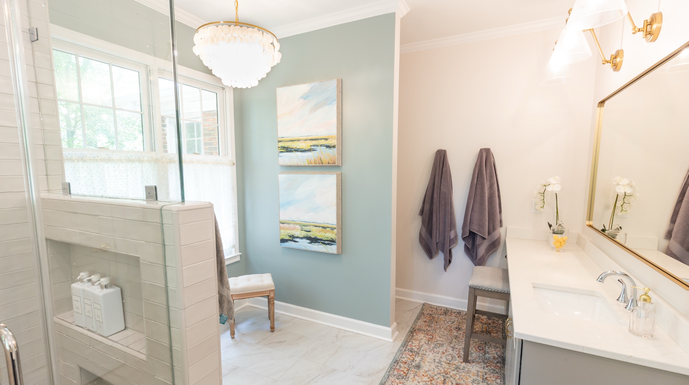 Renovated bathroom with brass fixtures